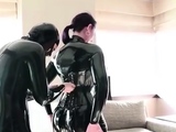 Two Lesbian Beauty Try Their New Corset with Latex